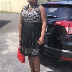 Black lace dress with cream slip.